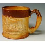 A Brampton salt glazed mug the cylindrical body relief moulded with huntsmen, horses and hounds,