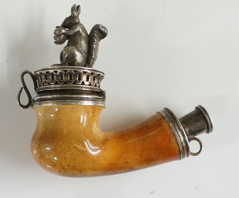 A Victorian silver mounted Meerschaum pipe the hinged lid set a squirrel holding a nut,