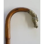 A crook handled walking stick,