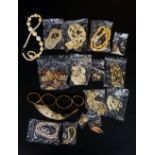 A bag of bone, ivory, shell and plastic jewellery in the form of necklaces,