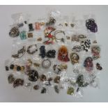 A bag of vintage and modern costume jewellery to include: variously multi-coloured plastic,