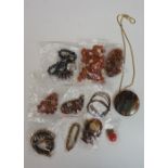 A bag of vintage and modern costume jewellery to include: a selection of loose carnelian ? beads;