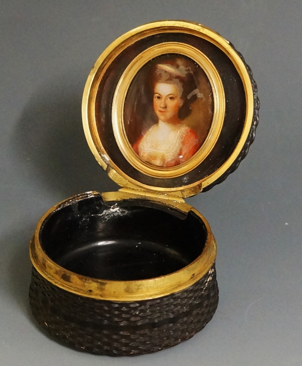 A mid 19th Century engine turned tortoiseshell circular box,