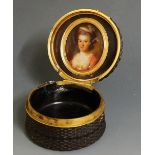 A mid 19th Century engine turned tortoiseshell circular box,