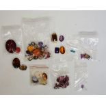 A selection of coloured stones, to include some glass, others possibly amethyst etc.