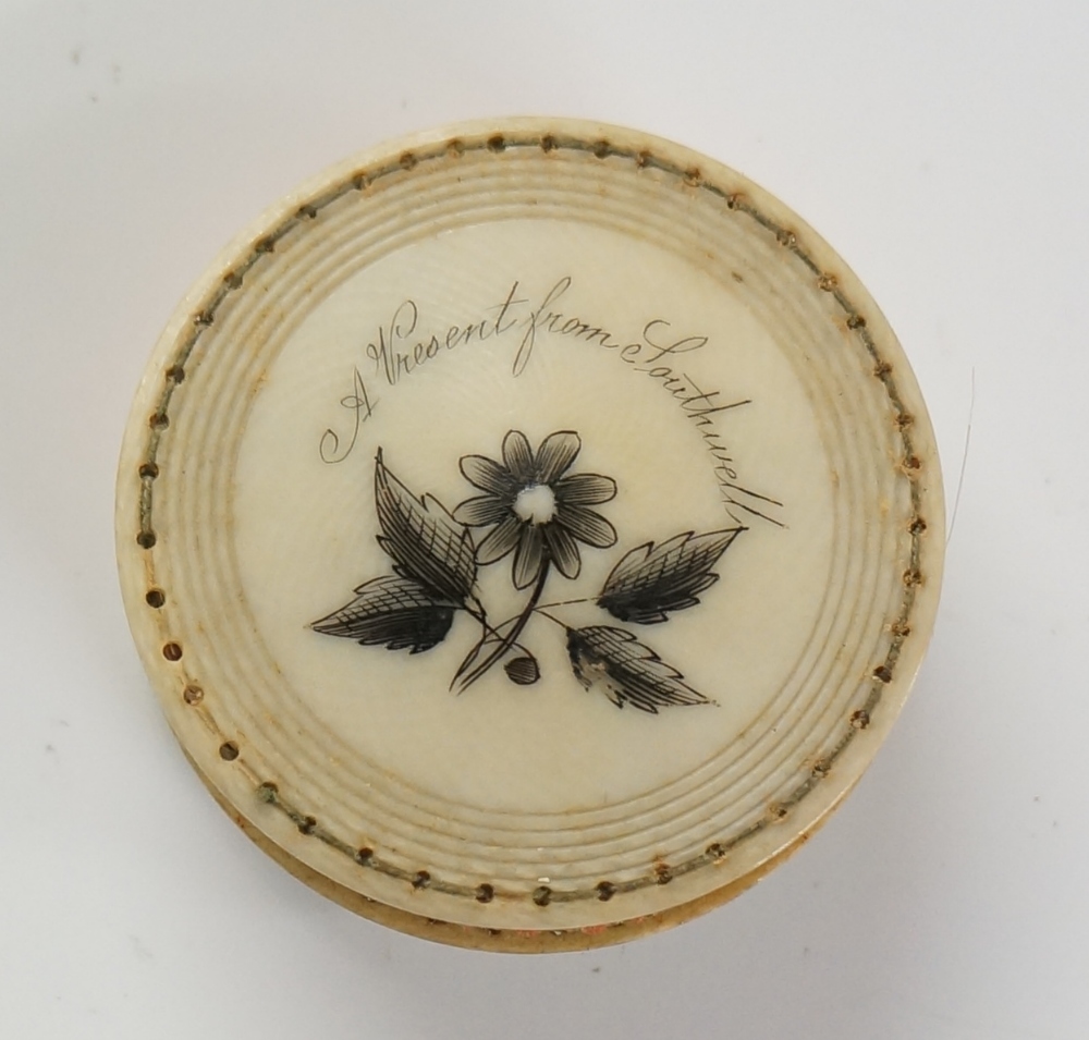 A 19th Century ivory pinwheel pin cushion,