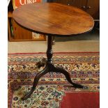 A mahogany tripod table, cm high, cm dia