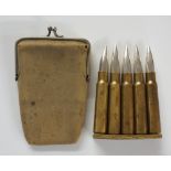 An unusual bullet clip necessaire set co