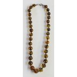 A set of green amber ? beads