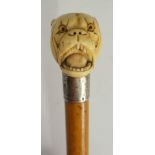 A late 19th Century walking stick, the i