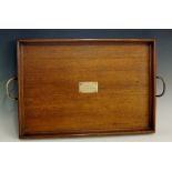 A two handled oak tray, the body with pl