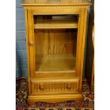 A Hi-Fi cabinet with glazed door, 96cm h