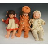 A selection of three dolls to include: a