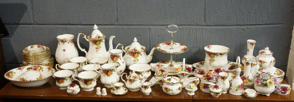 A large quantity of Royal Albert pattern china, to include: miniature tea set with teapot, cup,