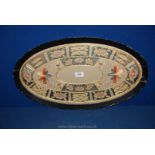 A 1920's Oval framed Embroidery of the Crown Derby Imari style design,