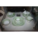 A delicate Shelley green banded pattern 12869 1930's part Teaset including five cups, six saucers,
