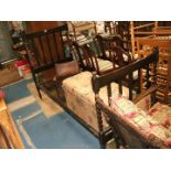 A 1940's Oak single Bedstead with slatted head and toe boards with barley twist supports and finial