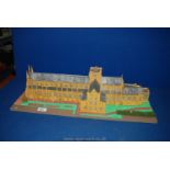A sealed model of Winchester Cathedral, light wood and card construction,