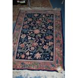 A floral pattern wool rug