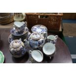 A part oriental Teaset including cups, saucers, tea plates, teapot, sucrier, slop bowl,