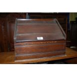 An antique wood Stationery Rack