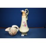 A Continental porcelain Ewer decorated with flowers and an unusual decorative Ewer