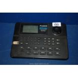 An Alesis SR-16 16 bit drum Machine, fully programmable with midi in-out/thru, with power supply.