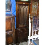 A reproduction Georgian style floor standing Corner Cabinet, with ten pane glazed upper door,