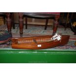 A large scratch made Sailing Boat approx 2 1/2' long includes sail and rudder