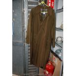 A gent's khaki Burberry's Raincoat, full length, large size and sun faded.