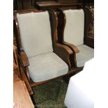 A pair of shepherd's style Oak framed Armchairs, plank backed with solid wing sides and arms,