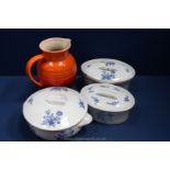 Three French porcelain Lidded Casseroles and a Le Crueset Jug