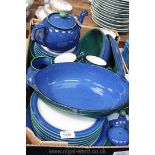 A large quantity of Denby 'Metz' tableware including teapot, salt & pepper, serving bowl,