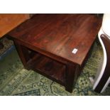 A modern square hardwood Coffee Table having plain top, on square legs with lower tier,