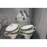 A Royal Doulton six setting Teaset with a bread and butter plate in 'Fontainebleau' pattern