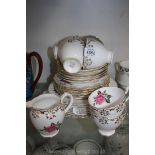 A pretty gilded pink rose Roslyn bone china part Teaset including cake plate, six cups, six saucers,