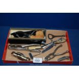 A box of miscellanea including Peterson Meerschaum Pipe (boxed), four penknives, nutcrackers,