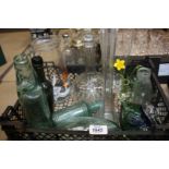 A quantity of clear and coloured glass including old Torpedo Bottle, Bugs Bunny Water Jug, Decanter,