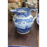 A large blue and white transfer printed Pearlware Milk Jug, river and cattle scenery, 8" tall,