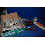 A quantity of Hornby Dublo railway stock including Royal Mail coach, goods wagons, etc.