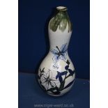 A Gourd shaped Vase decorated with lilies