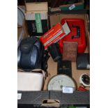 A box of miscellaneous including a red cash box, a cased Pentax camera,