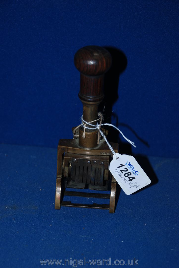 A Brass Desk stamp with Rosewood Handle