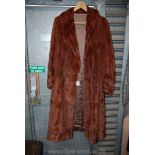 A full length Ladies Fur Coat by Jays of London