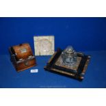 An Inkwell on stand with brass detail,