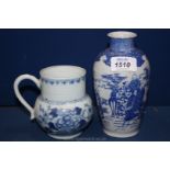 A small Oriental blue and white Vase 6 3/4" tall and a Tankard