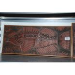 A hand-crafted Red Clay Plaque mounted on board, of a fish, signed "H.Y.