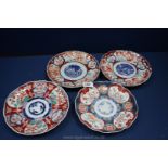 Four Imari Plates with scalloped rims