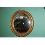 A circular gilt framed Convex Mirror,
