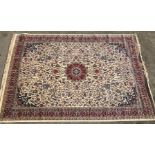 An ivory ground Kashmir Rug,